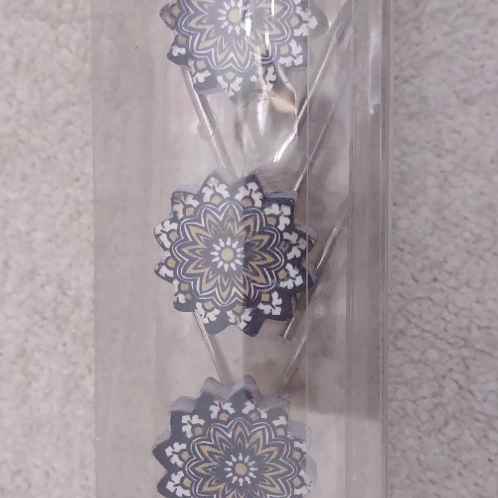 New shower curtain holders